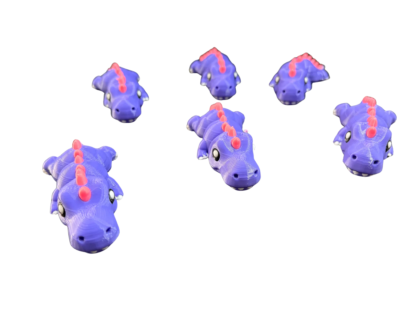 Purple and pink mini articulated T-Rex 3D prints